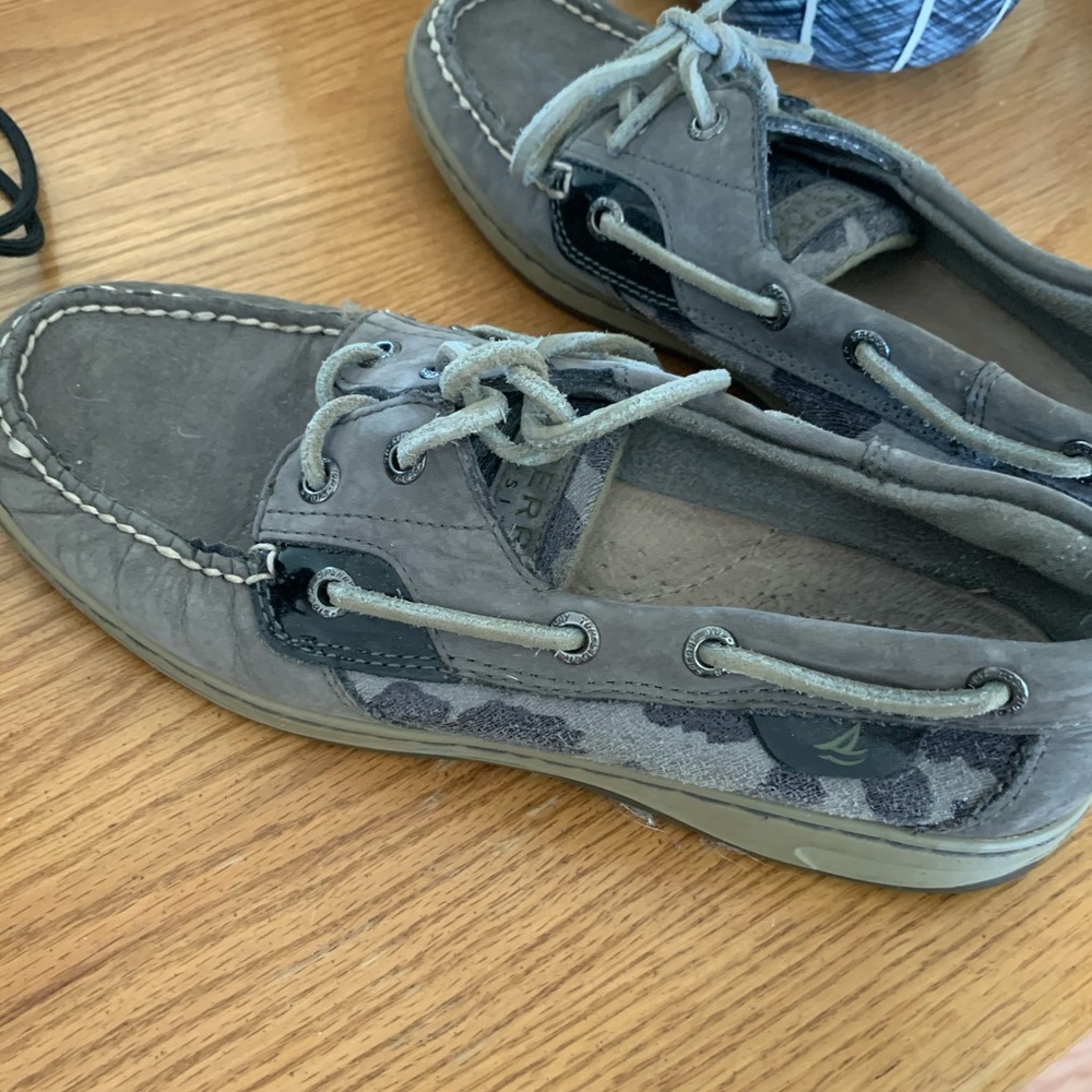 Grey and black Sperry’s